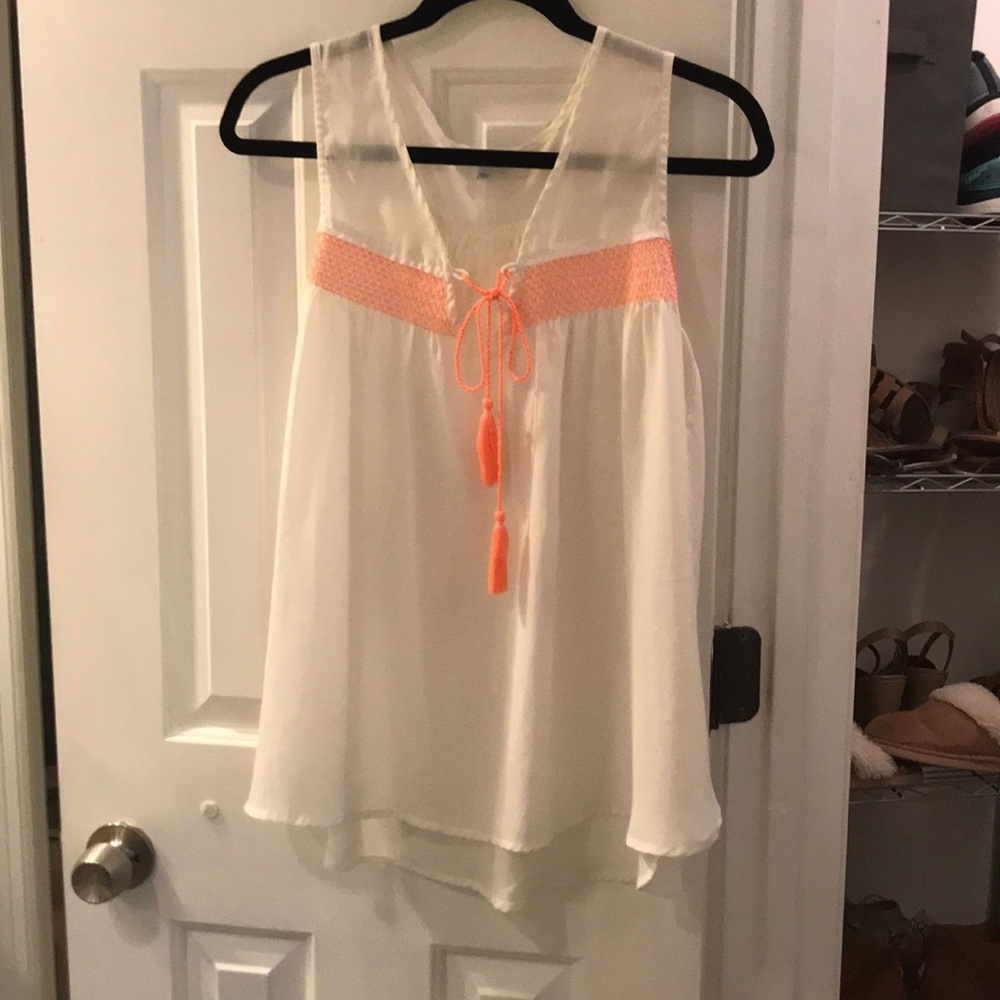 White and orange tank